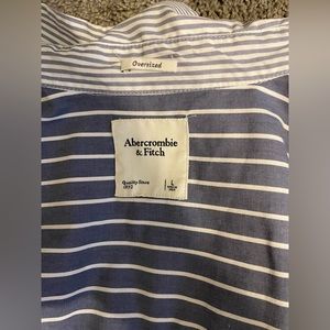 Selling an oversized button up, which was marketed to be a dress